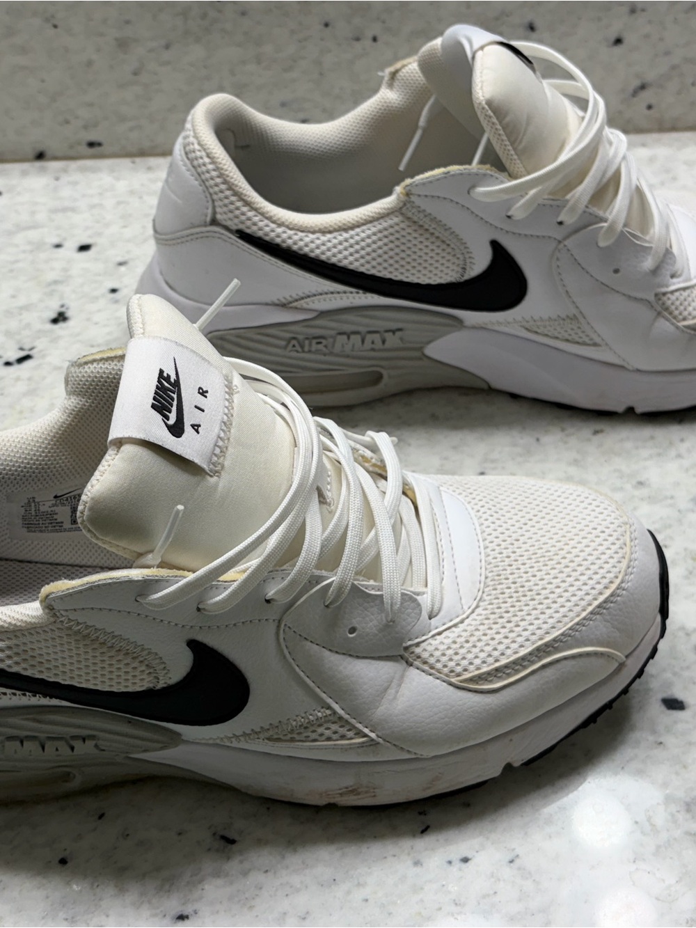 Nike White Air Max Sneakers with Black Swoosh